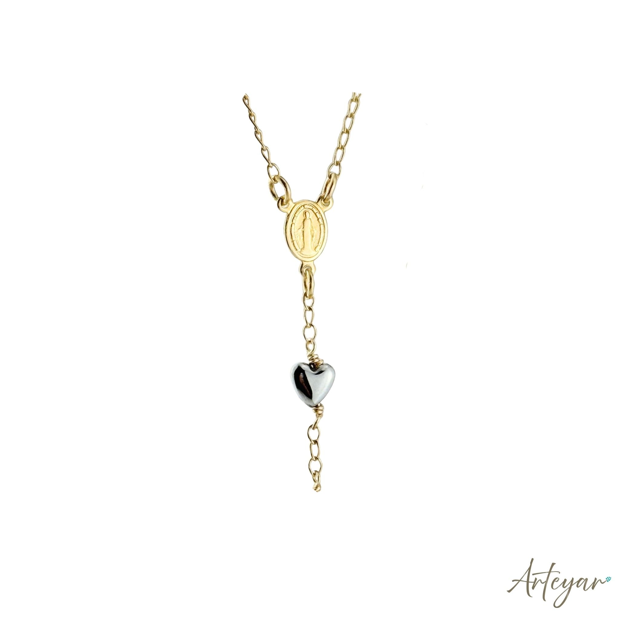 Golden Rosary with Heart-Shaped Hematite Beads, Gold Medal, and Cross, Rosary Design by Arteyar, Versatile for Prayer or as a Sophisticated Accessory.