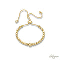 Elegant Golden Beaded Bracelet with an Adjustable Sliding Clasp, Lien Design by Arteyar, Polished and Versatile Jewelry, Ideal for Solo Wear or Stacking.