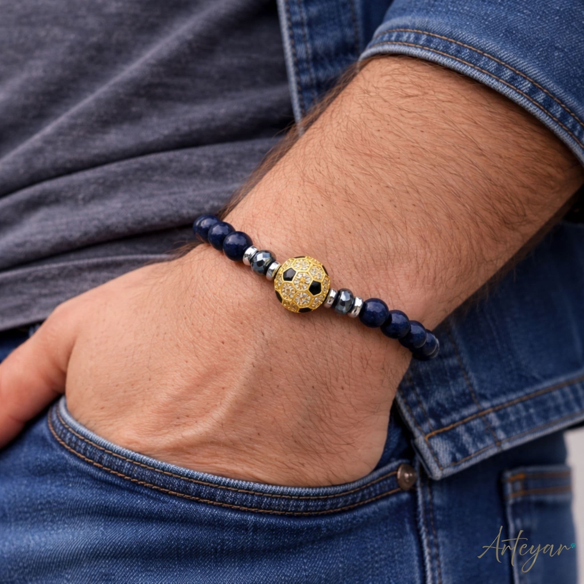 Elegant Lapis Lazuli Stretch Bracelet with a Golden Crystal-Inlaid Soccer Ball Charm, Miami Soccer Design by Arteyar, Sophisticated Sporty Jewelry for Soccer Fans.