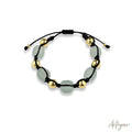 Elegant Unisex Bracelet with Mint Green Ganha Beads and Golden Accents on a Black Cord, Menta Design by Arteyar, Modern and Sophisticated Adjustable Jewelry for Everyday Wear.