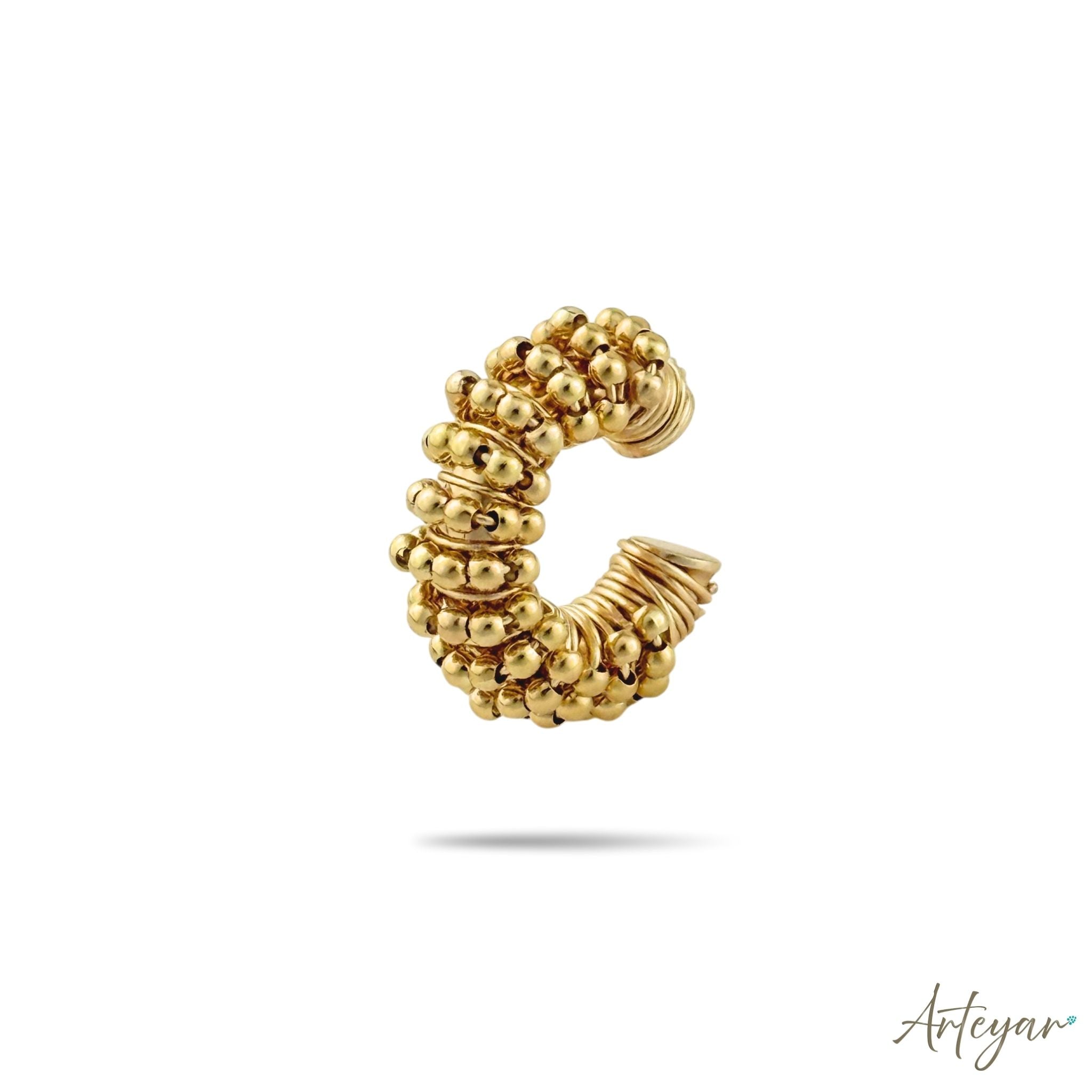 Elegant Golden Ear Cuff with Matching Golden Beads on an Artisan Coiled Wire Structure, Orbit Design by Arteyar, Sophisticated Pierce-Free Jewelry with Monochromatic Golden Luxury.