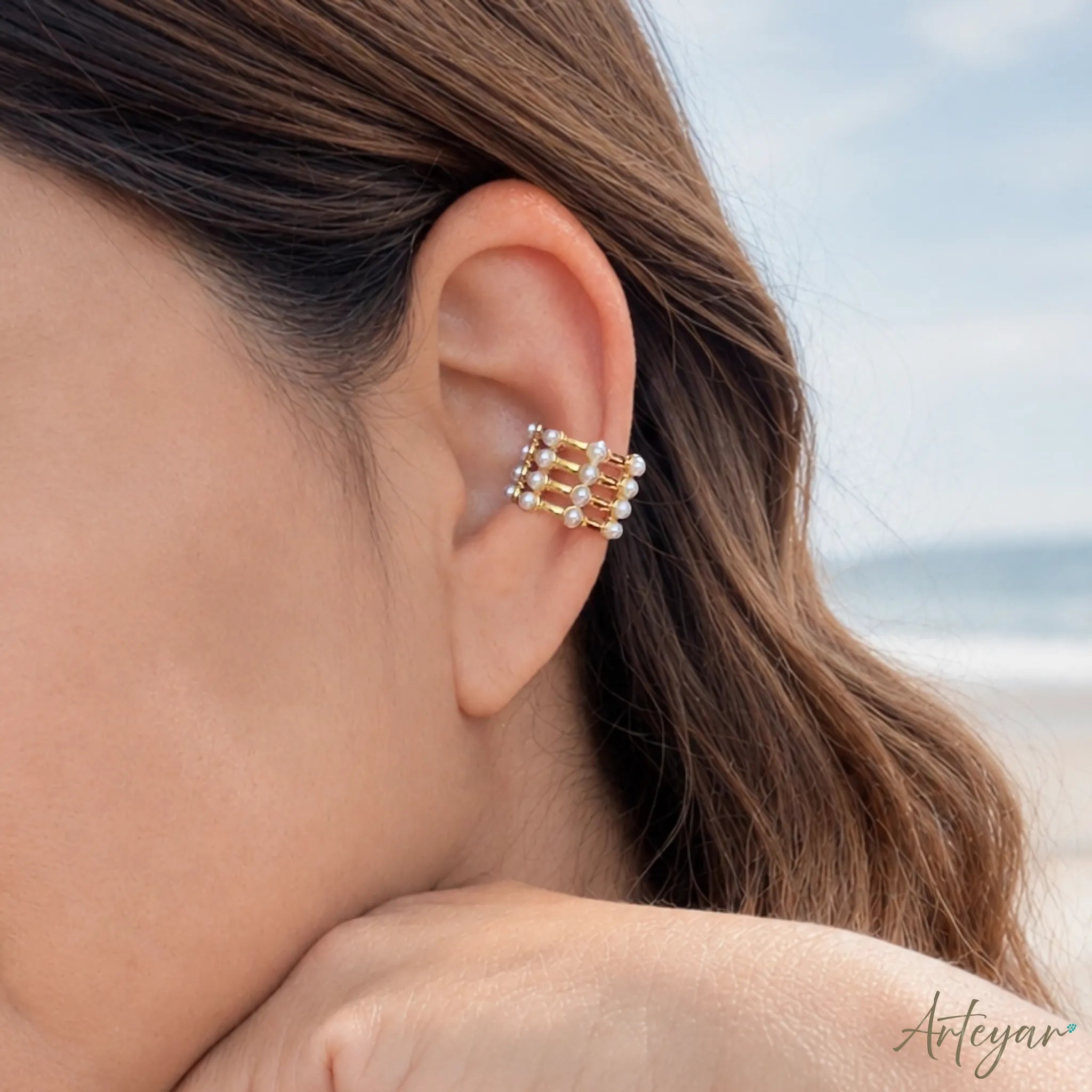Gold Ear Cuff with Multiple Bands and White Pearls for Women, Calista Design by Arteyar, Modern Non-Piercing Jewelry with Avant-Garde Elegance.