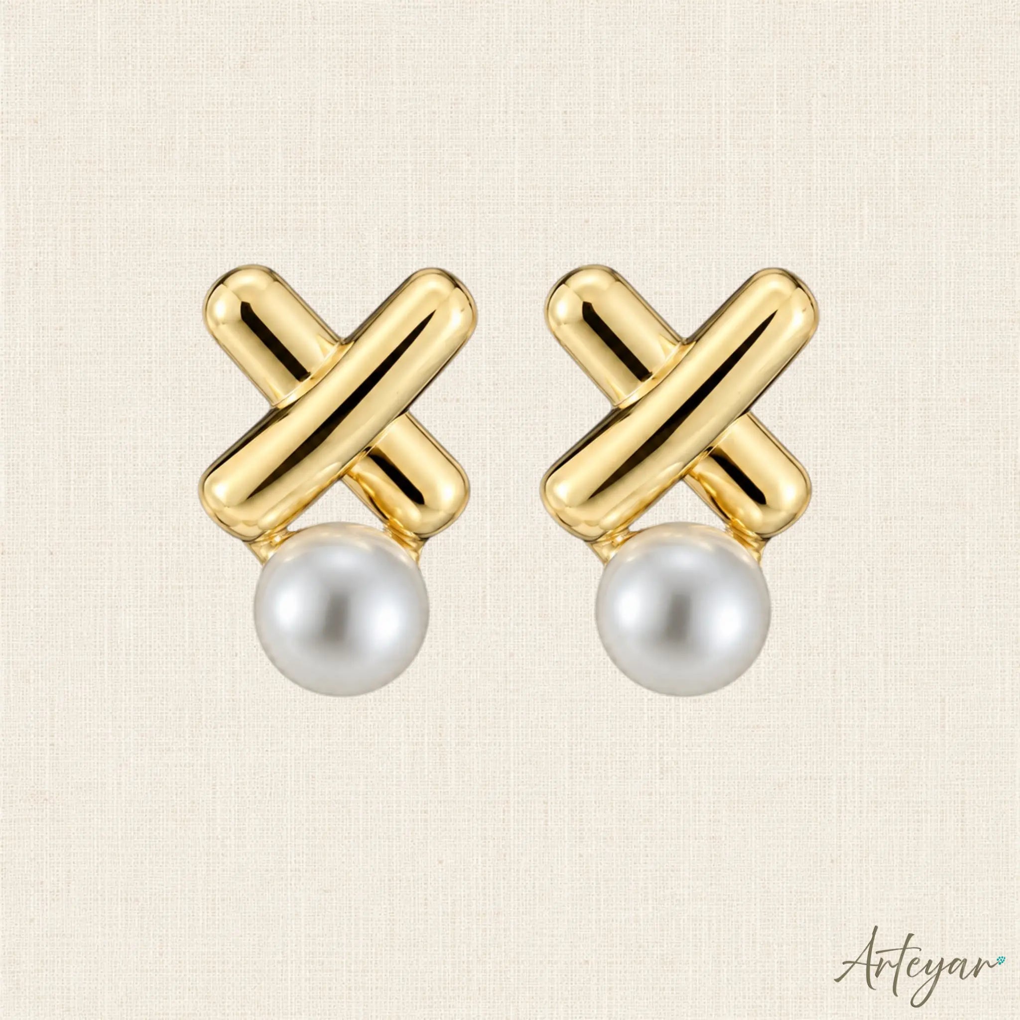 Elegant Golden Earrings with a Luminous Pearl Nestled Between Polished Criss-Cross Bars, Liai Design by Arteyar, Modern Geometric Jewelry with Timeless Elegance.
