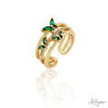 Sophisticated Gold-Plated Ring with Green Zirconia and Intertwined Bands, Flutter Green by Arteyar, Elegant Statement Jewelry for Women.