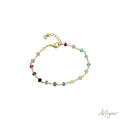 Elegant Golden Chain Bracelet with Faceted Multicolor Tourmalines, Prisme Design by Arteyar, Adjustable and Sophisticated Colorful Jewelry, Versatile for Daily Wear.