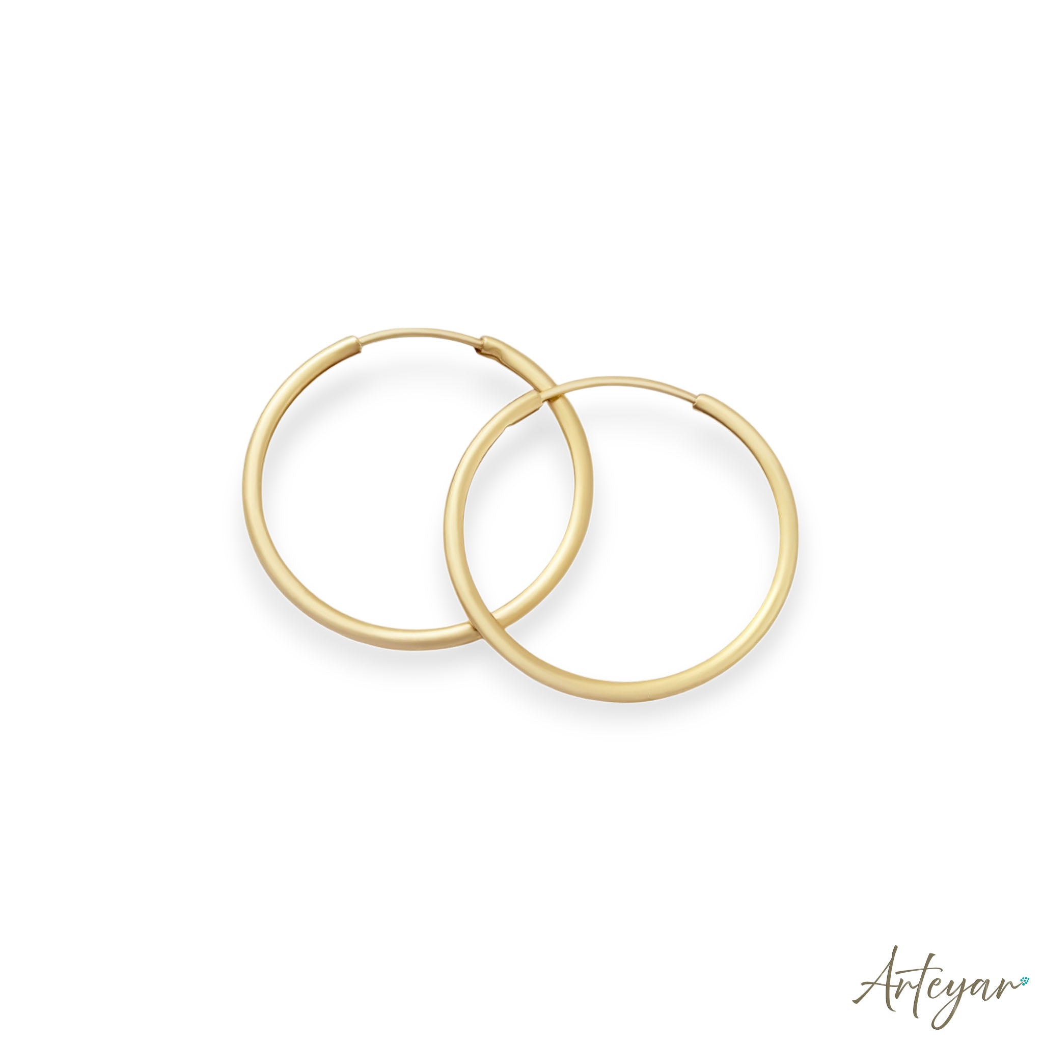 Golden Hoop Earrings for Women, Serene Design by Arteyar, Classic Elegant Round Jewelry for All Occasions.