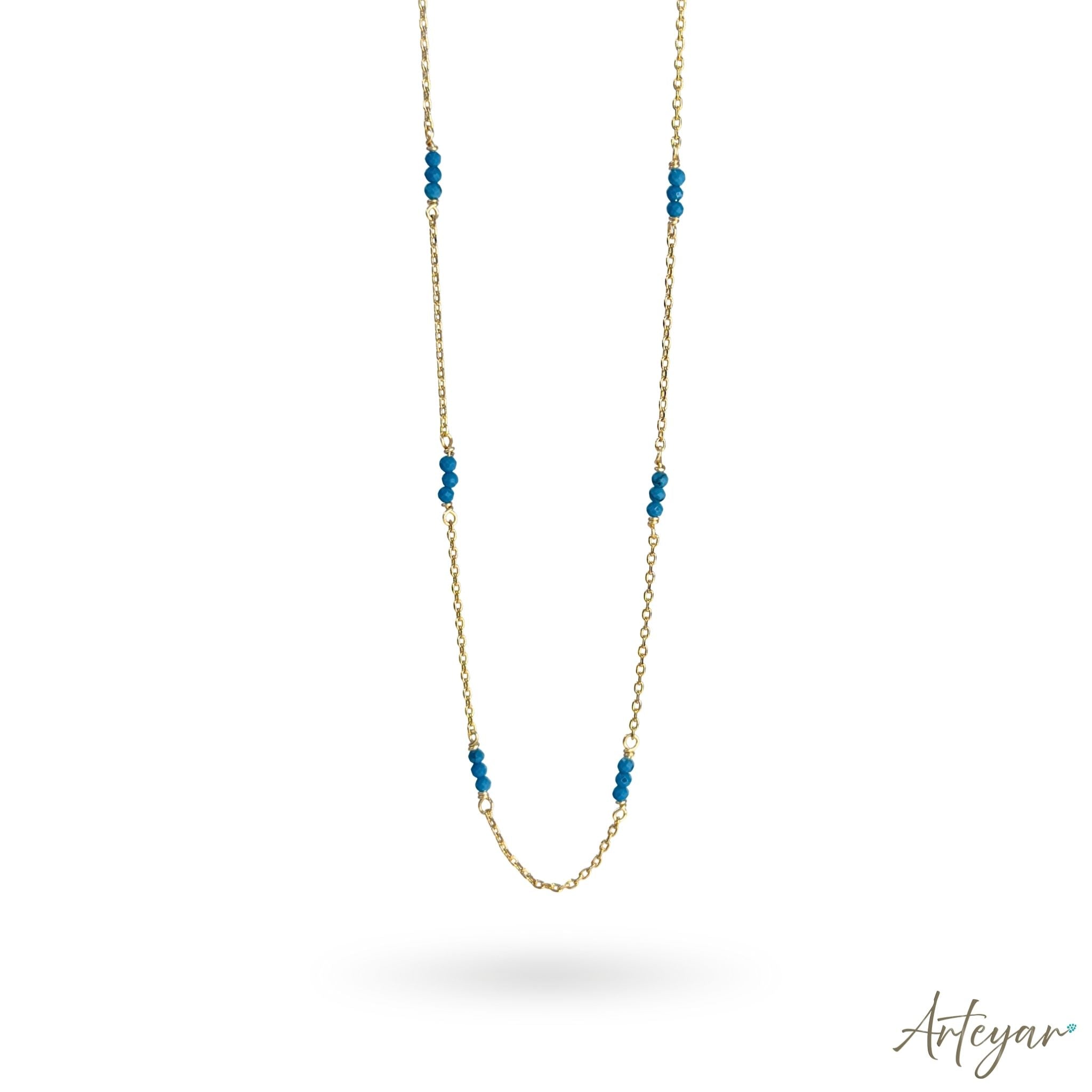 Delicate Golden Necklace with Small Turquoise Accents and an Adjustable Extension Chain, Lumi Turquoise Design by Arteyar, Sophisticated and Minimalist Jewelry for Daily Wear.
