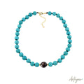 Elegant Hand-Knotted Necklace with Fresh Turquoise Beads and a Striking Pearlescent Stone, Gaia Turquoise Design by Arteyar, Modern Jewelry that Adds Sophisticated Color.