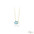 Gold Necklace with Turquoise Stones and Interlocking Rings for Women, Fusió Turquoise Design by Arteyar, Minimalist Elegant Jewelry Symbolizing Harmony, Ideal for Daily and Special Occasions.