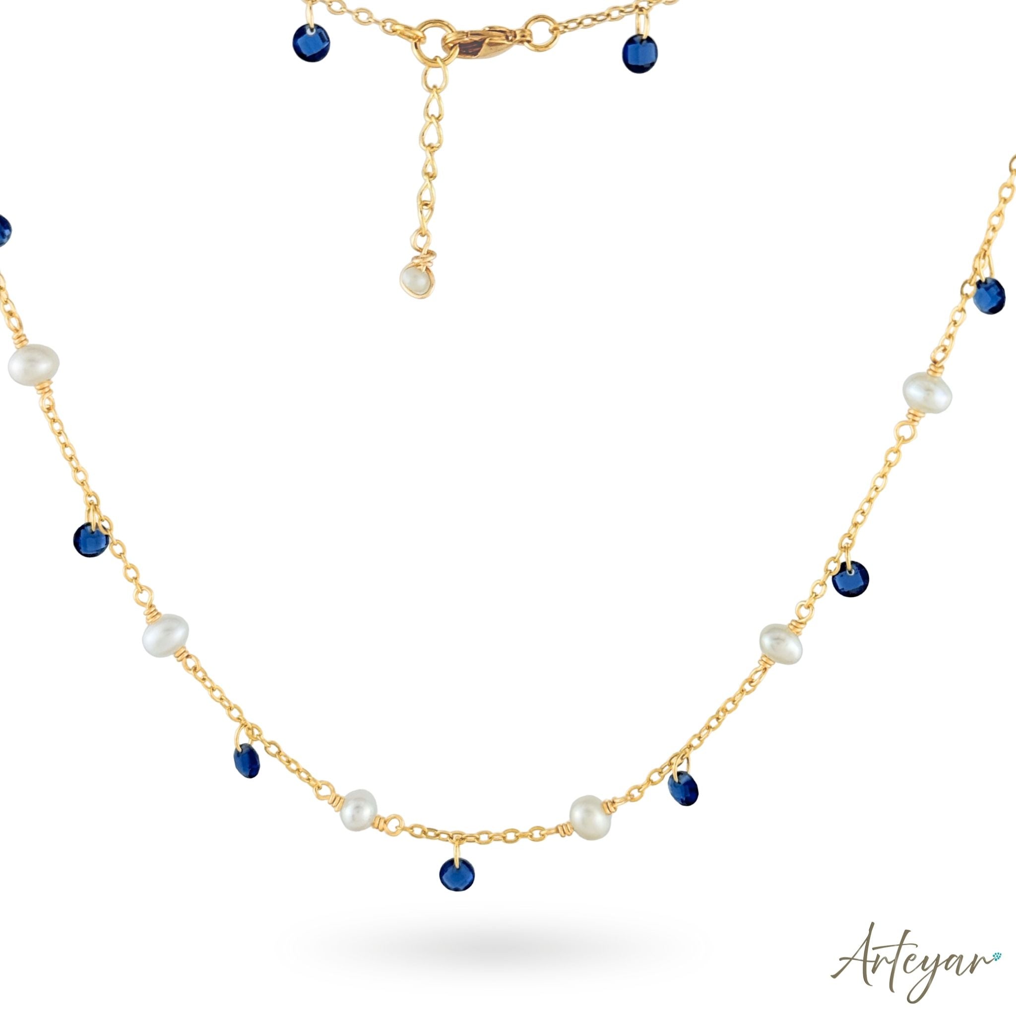 Elegant Golden Chain Necklace with Luminous Pearls and Vibrant Blue Crystals, Whisper Necklace - Blue Design by Arteyar, Minimalist and Sophisticated Jewelry for Layering.