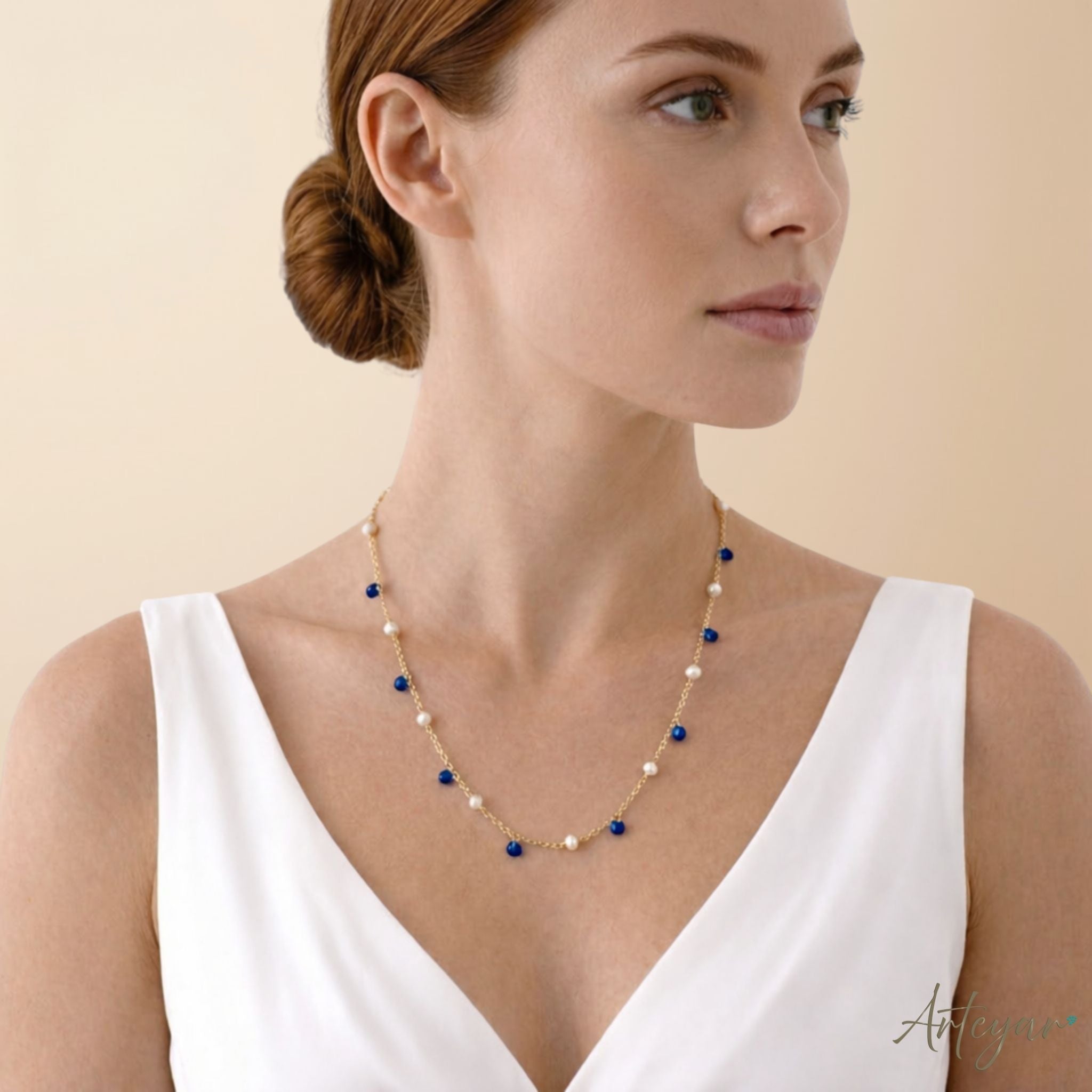 Elegant Golden Chain Necklace with Luminous Pearls and Vibrant Blue Crystals, Whisper Necklace - Blue Design by Arteyar, Minimalist and Sophisticated Jewelry for Layering.