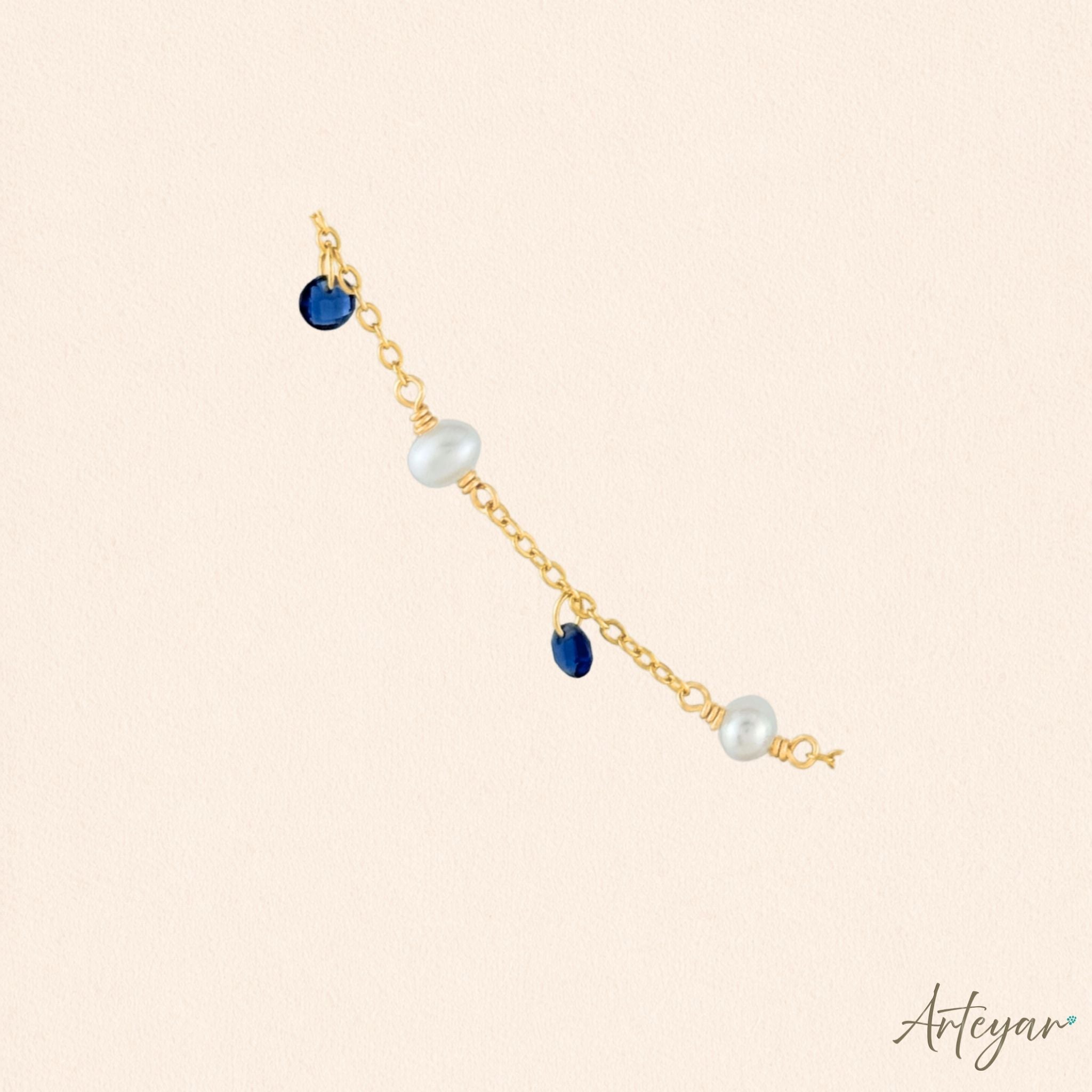 Elegant Golden Chain Necklace with Luminous Pearls and Vibrant Blue Crystals, Whisper Necklace - Blue Design by Arteyar, Minimalist and Sophisticated Jewelry for Layering.