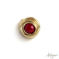 Bold spiral ring with red coral and golden wire – Nido Coral by Arteyar