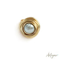 Elegant Ring with a Lustrous Pearl Centerpiece Encircled by Gold Wire Spirals, Nido Pearl Ring Design by Arteyar, Minimalist and Striking Statement Jewelry.