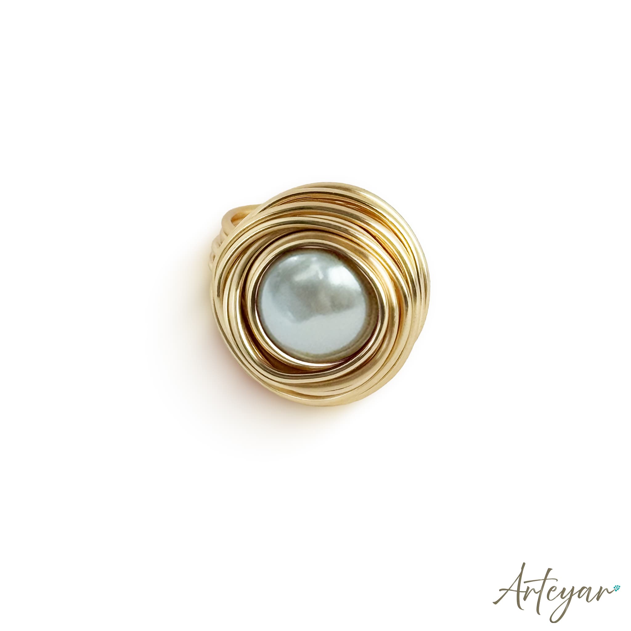Elegant Ring with a Lustrous Pearl Centerpiece Encircled by Gold Wire Spirals, Nido Pearl Ring Design by Arteyar, Minimalist and Striking Statement Jewelry.