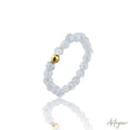 Elegant ring with transparent faceted crystal and gold bead – Luce Crystal by Arteyar.