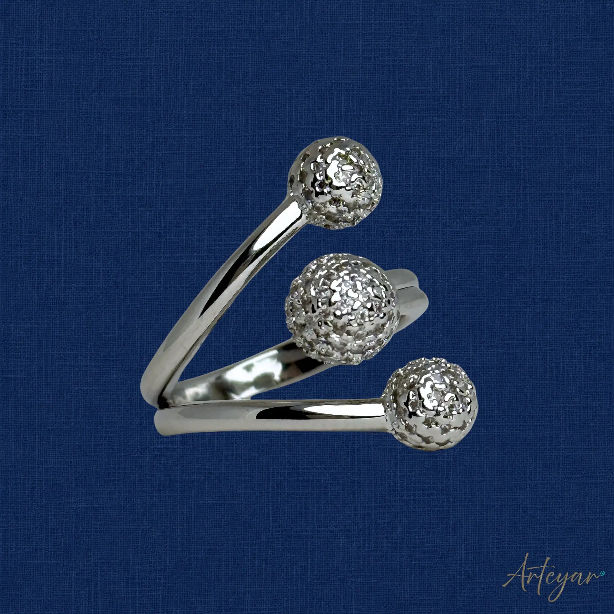 Sleek Silver Ring with a Modern Curved Design and Three Crystal-Adorned Spheres, Trío Design by Arteyar, Minimalist and Sophisticated Contemporary Jewelry, a Unique Statement Piece for Everyday Luxury.